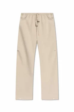 Fear Of God Essentials beżowy Spodnie z obniżonym krokiem