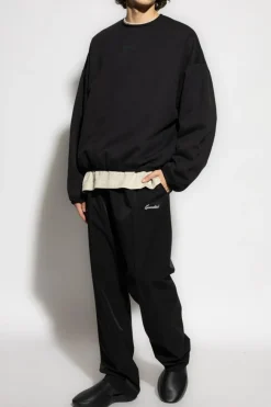 Fear Of God Essentials CZARNY Spodnie z obniżonym krokiem