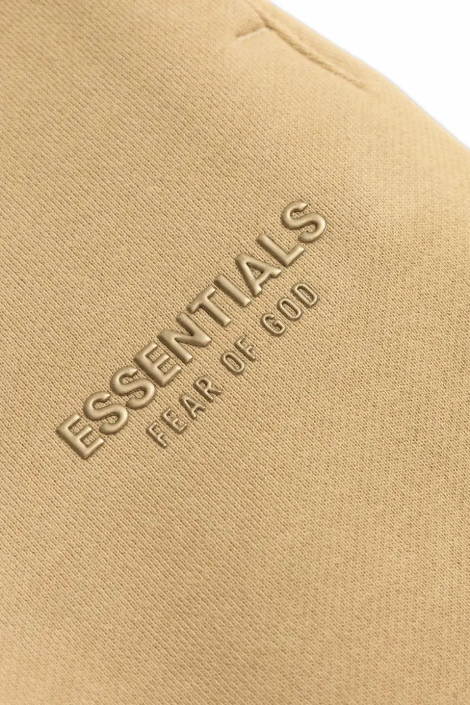 Fear Of God Essentials Kids beżowy Dresowe spodnie