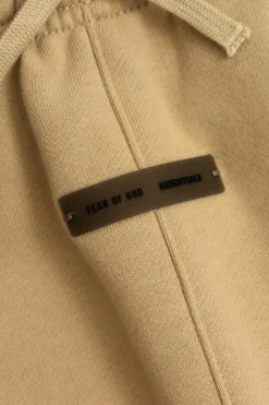 Fear Of God Essentials Kids beżowy Dresowe spodnie