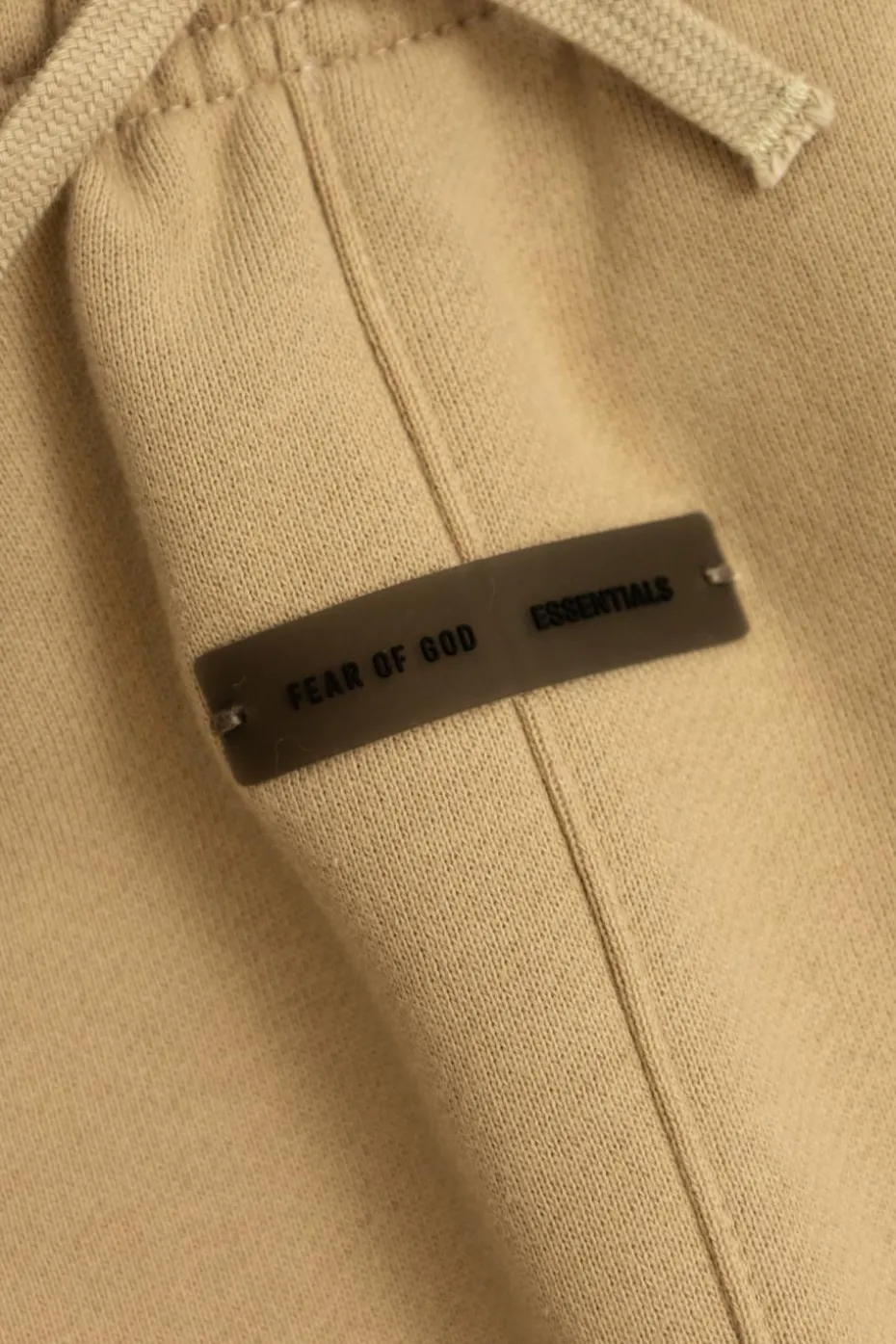 Fear Of God Essentials Kids beżowy Dresowe spodnie