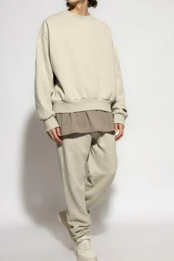 Fear Of God Essentials kremowy Bluza z logo