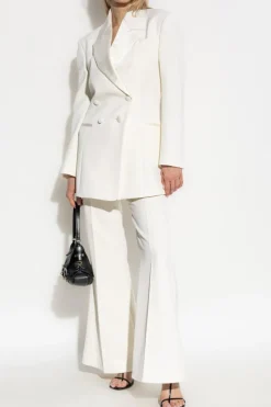 Givenchy kremowy Spodnie z rozszerzanymi nogawkami w kant