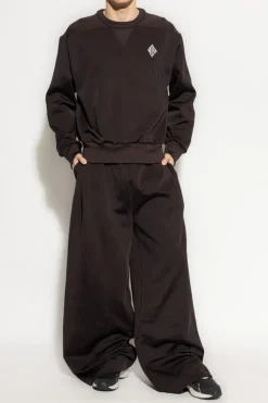 LACOSTE RUNWAY BRĄZOWY Spodnie z logo