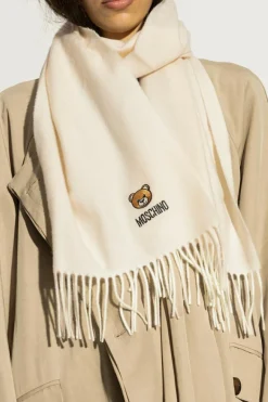 Moschino kremowy Wełniany szal z logo
