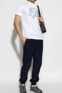 Versace GRANATOWY Spodnie dresowe ze wzorem `barocco`