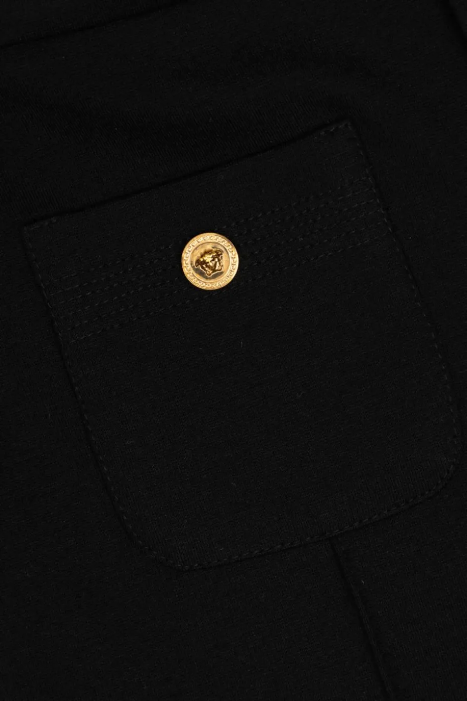 Versace Kids CZARNY Spodnie z przeszyciem na nogawkach