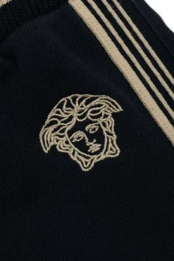 Versace Kids GRANATOWY Dresowe spodnie z lampasami